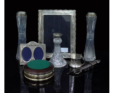 A SELECTION OF SILVER ITEMS to include photo frames, a bottle coaster, silver handled button hook, pair of cut glass waisted 