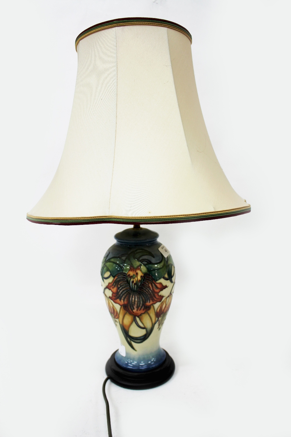 A MOORCROFT POTTERY TABLE LAMP of inverted baluster form decorated with