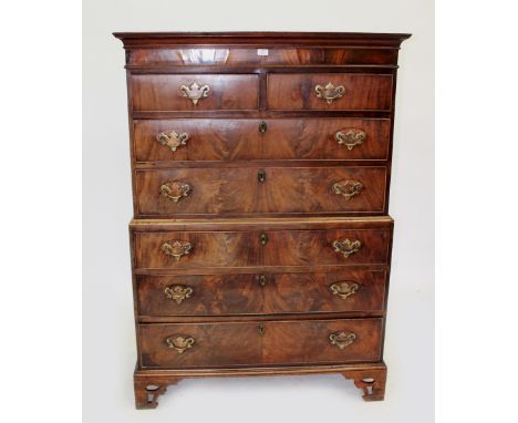 A 19TH CENTURY MAHOGANY CHEST ON CHEST  with two short and five long drawers, raised on fret carved bracket feet, 108cm wide 