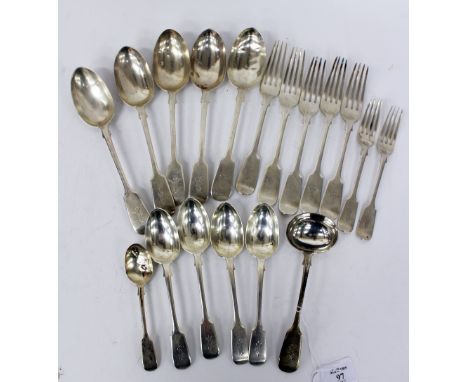 A QUANTITY OF FIDDLE PATTERN SILVER CUTLERY of various dates but all with the same monogram, consisting of five table spoons,
