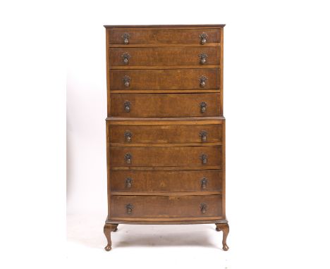 A 20TH CENTURY BURR WALNUT VENEERED BOW FRONTED CHEST on chest with eight long drawers and cabriole legs 76cm wide x 44cm dee