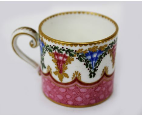 A SEVRES PORCELAIN COFFEE CAN with polychrome enamel decoration and loop handle, 4.5cm high