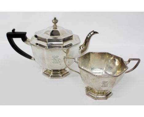 A GEORGE V SILVER OCTAGONAL TEA POT  together with a matching sugar basin, both with marks for London 1910 and makers mark TB