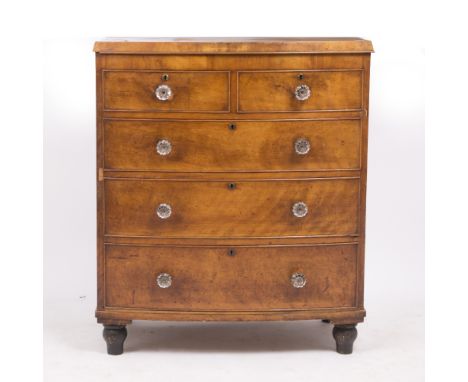 A VICTORIAN MAHOGANY BOW FRONT CHEST of two short and three long drawers with moulded knob handles and turned bun feet 93cm w
