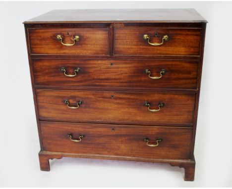 A LATE 18TH CENTURY MAHOGANY CHEST OF TWO SHORT AND THREE LONG DRAWERS with brass swan neck handles and standing on bracket f