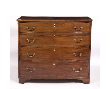 A GEORGIAN MAHOGANY BOW FRONTED CHEST of four long drawers standing on bracket feet 112cm wide x 99.5cm high 