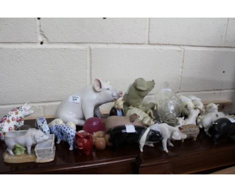 A COLLECTION OF PIGS to include Royal Copenhagen, Beswick, Belleek and others in ceramic and glass