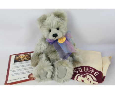 Charlie Bears - "Mr Jingles" CB173591 A jointed bear in good condition approx 33 cm long, with vertical stitched nose and wea