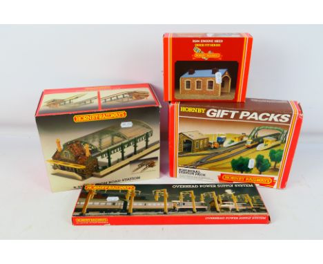 Hornby Railways - Four OO scale model railway items to include R331 London Road Station, R595 Rural Station Pack, R504 Engine