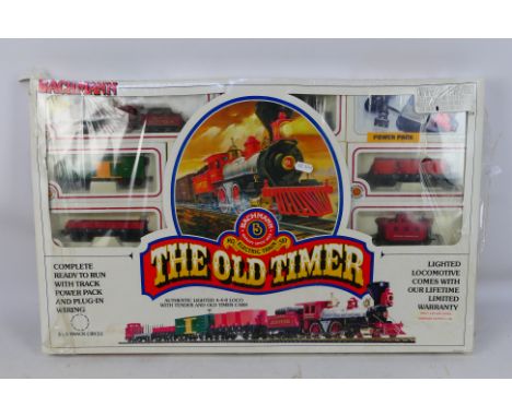 Bachmann - A boxed HO gauge Bachmann The Old Timer train set # 00275. The set is still shrink wrapped but the wrapping a spli