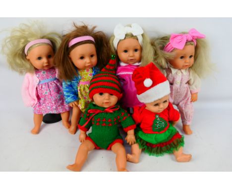 Mattel - Others - An unboxed group of predominately Tiny Tears dolls circa 2000's. Conditions appear to be generally Good - V
