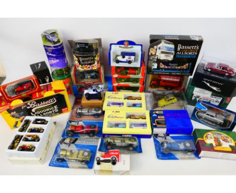 Corgi - Atlas Editions - Lledo - Others - An assortment of approximately 30 boxed diecast vehicles in varying scales to inclu