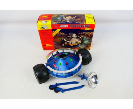 Century 21 Toys - A boxed vintage battery operated Moon Prospector. The model appears in Very Good condition overall but the 