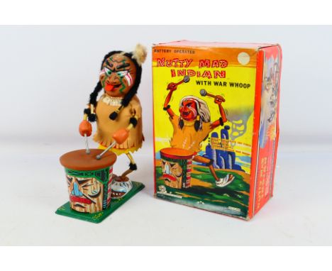Louis Marx - A boxed vintage battery powered Marx Nutty Mad Indian with War Whoop. The model appears in Excellent condition i
