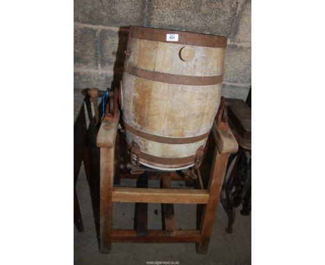 A vintage Butter Churn on stand, 46'' tall overall.