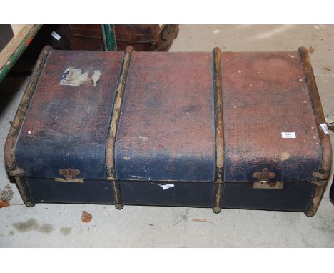 A 1950's bentwood bound Blue travel trunk with striped lining and internal tray.