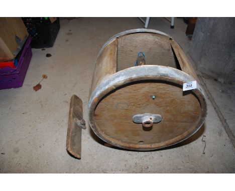 A butter churn with paddles.
