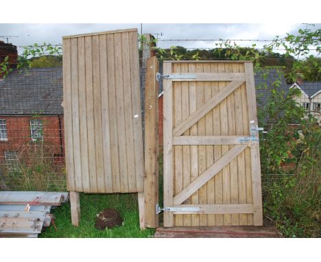 A large Jacksons garden Gate 40" x 70" high approx. and Jacksons infill fence panel 34" x 70" high.