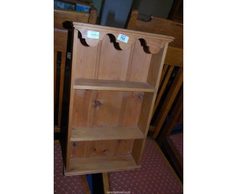 A small pine shelf unit  14 1/2" x 25" high x 4" depth.