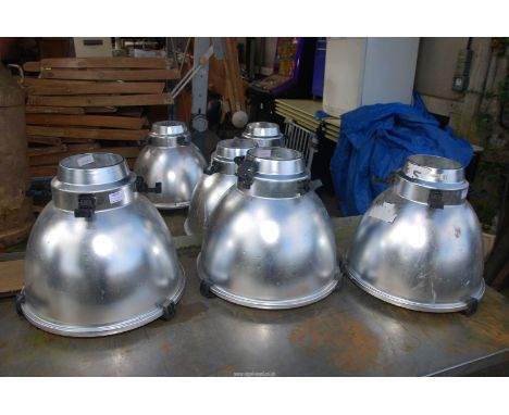 Six industrial light shades.