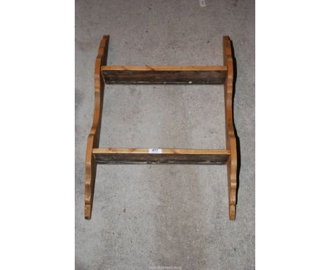A small pine wall mounted shelf unit, 17 1/2'' x 25 1/2''.  
