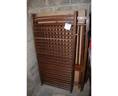 A vintage wooden cot.