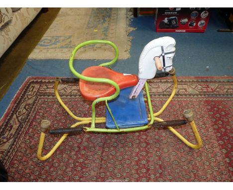 A child's metal rocking horse.