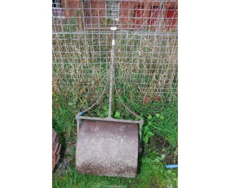 A cast iron roller.