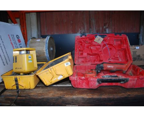A "Hilti battery operated angle grinder (for spares an repairs) and a laser level for spares and repairs.