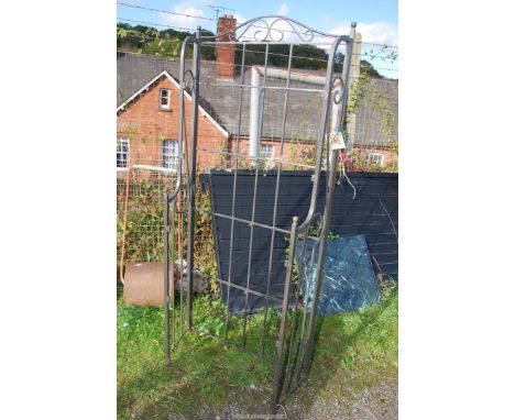 A wrought iron shelf unit, shelves missing  6' high x 32" wide.