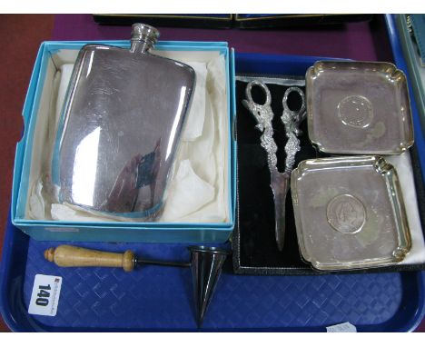 A Large EPBM Hip Flask, of plain design; together with a pair of grape scissors, four coin inset ashtrays and a hallmarked si