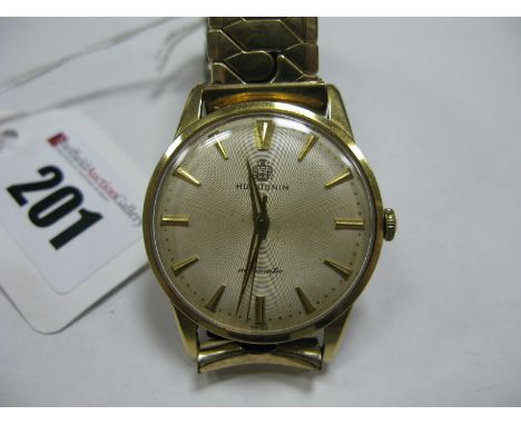 Huguenin; A Vintage Automatic Gent's Wristwatch, the signed dial with baton markers and centre seconds, within plain case, st