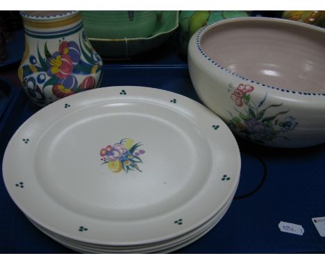 Six Poole Pottery Plates, each with stylized floral motif to centre, three green dot bunches to rim S/PC 111. 23.5cm diameter