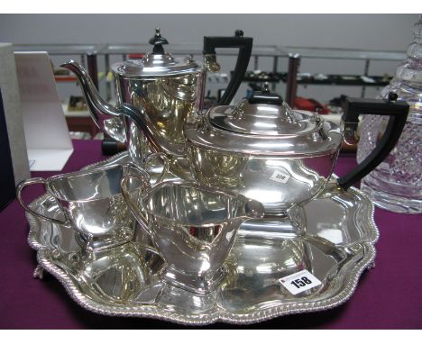 A Silver Plated Four Piece Tea Service, Walker &amp; Hall salver with shaped gadrooned boarder on claw feet, all Sheffield ma