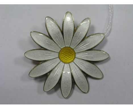 Aksel Holmsel; A Norwegian Enamel Daisy Brooch, highlighted in white and yellow enamel, stamped makers mark for Aksel Holmsel