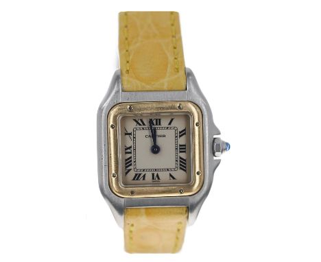 Cartier stainless steel and gold lady's wristwatch, serial no. 669210xxxxx, silvered dial, gold bezel, cabouchon crown, moder
