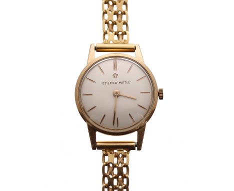 Eterna-Matic 18k ladies wristwatch, silvered dial with baton markers, 18k bracelet, case no. 4345872, 26gm, 24mm-** with a bo