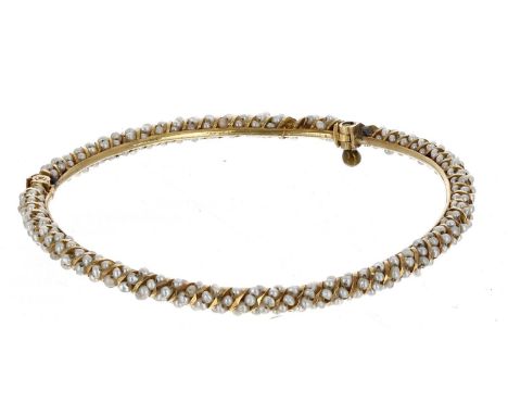 Yellow metal pearl set bangle, 11.8gm(at fault) 