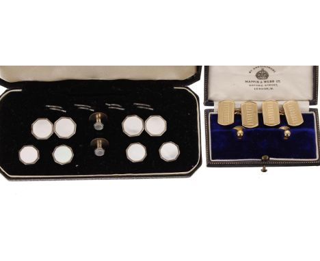 Pair of 9ct engine turned cufflinks, London 1952, 11.7gm, 17mm x 11mm; with a pair of Mappin &amp; Webb boxed 9ct dress studs