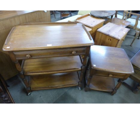 An Ercol Golden Dawn elm and beech trolley and a side table 