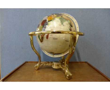 A gem stone effect terrestrial globe 