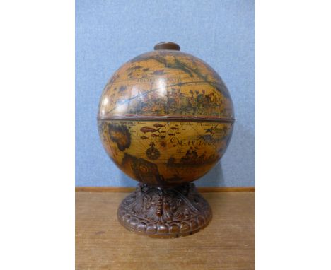 A table top terrestrial globe cocktail cabinet 