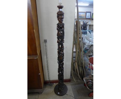 An African carved hardwood tree of life floor standing lamp 