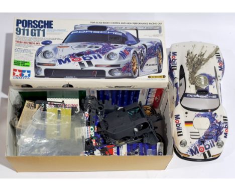 Tamiya Porsche 911 GT1 Racing Car 1:10 scale Radio Control Model Kit, boxed.&nbsp; Although untested &amp; unchecked for comp