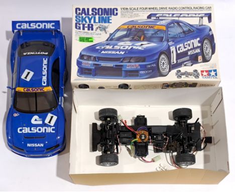 Tamiya Calsonic Skyline GT-R Racing Car 1:10 scale Radio Control Model Kit, built &amp; boxed.&nbsp; Although untested &amp; 