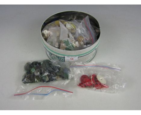 A tin of vintage buttons