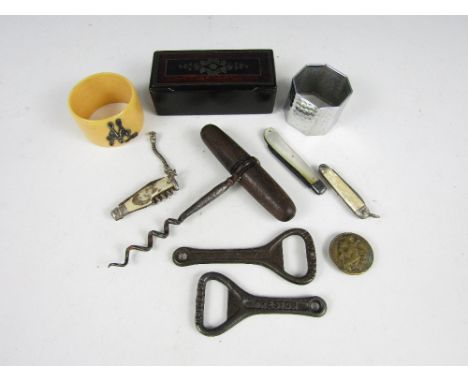 A black lacquered snuff box together with three pen knives and a corkscrew etc