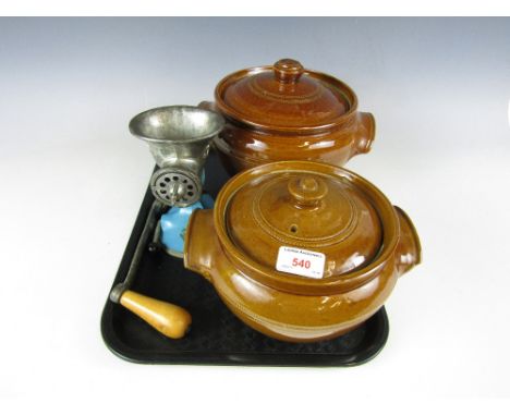 A vintage mincer together with two stoneware tureens
