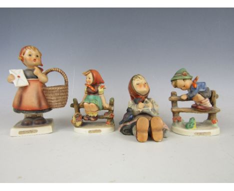 Four Hummel figurines