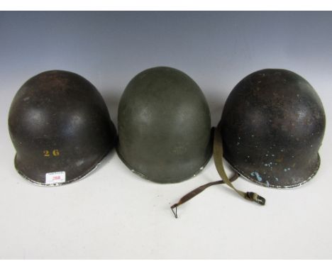Three WWII US Army 'front seam' M1 helmets